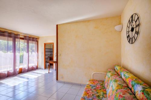 Ένα ή περισσότερα κρεβάτια σε δωμάτιο στο Appartement 4 personnes Le Tignet