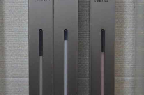 a group of four toothbrushes sitting next to a window at Soldongsan Stay in Seogwipo