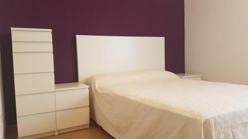 Ένα ή περισσότερα κρεβάτια σε δωμάτιο στο Casa Ambite