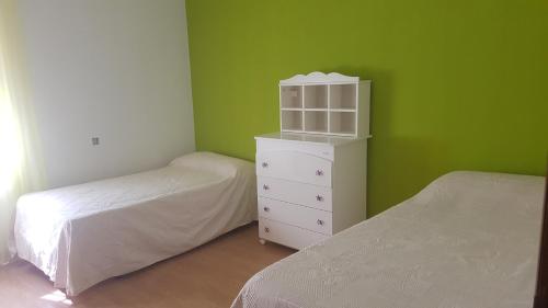 Ένα ή περισσότερα κρεβάτια σε δωμάτιο στο Casa Ambite