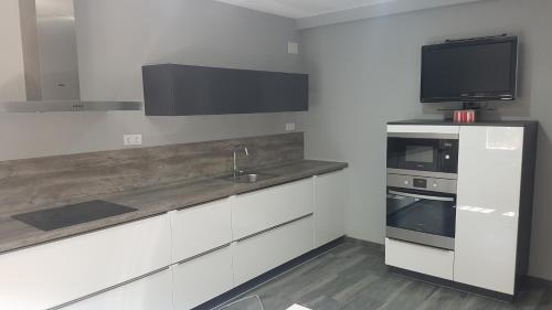 Η κουζίνα ή μικρή κουζίνα στο Casa Ambite