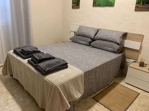 Posteľ alebo postele v izbe v ubytovaní Apartamento Completo Regina