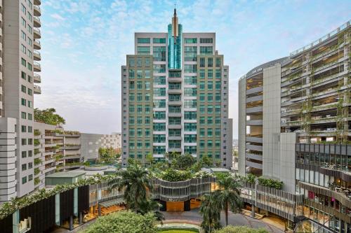 a view of a city with tall buildings at Sheraton Surabaya Hotel & Towers in Surabaya