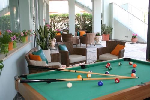 a pool table in the lobby of a hotel at Hotel Diamante in Francavilla al Mare