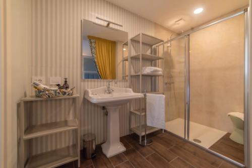 a bathroom with a sink and a shower at I Castagni in Vigevano