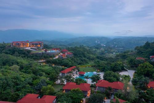 an aerial view of a resort in the mountains at Mahua Bagh Resort Kumbhalgarh in Kumbhalgarh