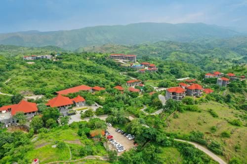 an aerial view of a resort on a mountain at Mahua Bagh Resort Kumbhalgarh in Kumbhalgarh