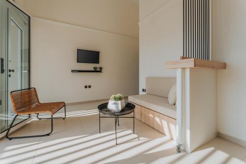 TV a/nebo společenská místnost v ubytování Ponte Suites