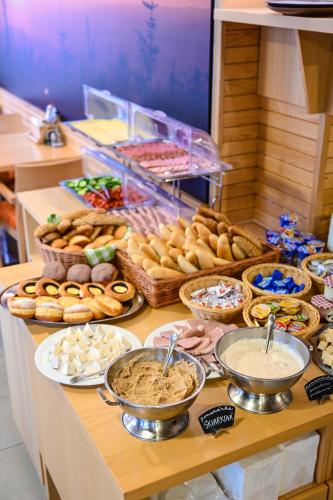 a buffet filled with lots of different types of food at Hotel Jirinka in Dolní Morava