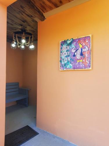 a painting hanging on the wall of a room at Peace Haven @ Windfarm Accommodation in Yzerfontein