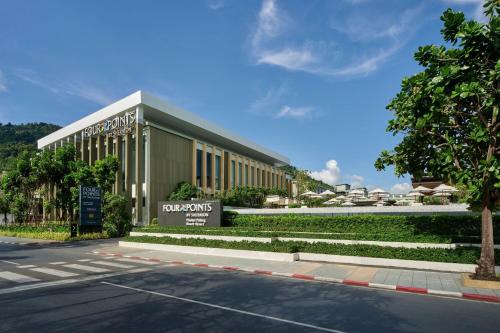 a building on the side of a street at Four Points by Sheraton Phuket Patong Beach Resort in Patong Beach