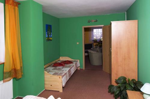 Cama o camas de una habitación en Hostinec U Zlaté lípy