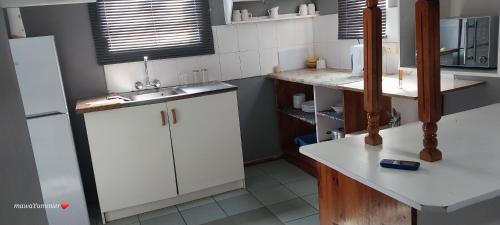 Kuchyň nebo kuchyňský kout v ubytování Rato Thato Guest House