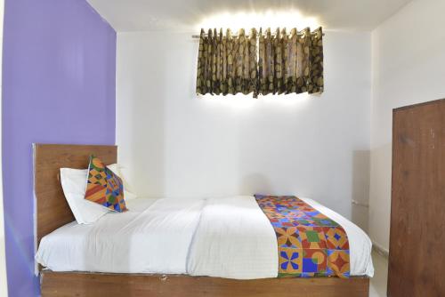 Postel nebo postele na pokoji v ubytování HOTEL GOLD LEAF