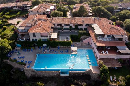 an aerial view of a house with a swimming pool at Casa Eva Luna by Wonderful Italy in Olbia