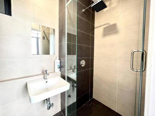 a bathroom with a sink and a shower at Walk to Legoland, Kid Lego Toys, D'Pristine Medini in Nusajaya