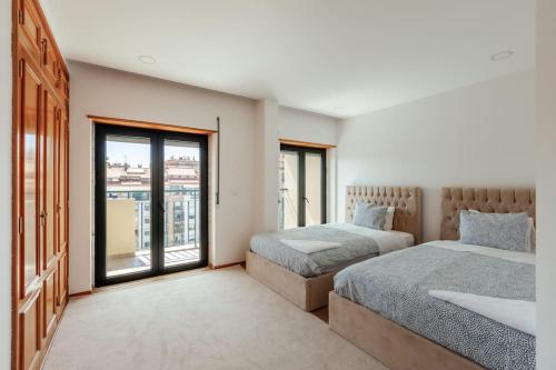 Ένα ή περισσότερα κρεβάτια σε δωμάτιο στο Glam 2 bedroom In Massamá