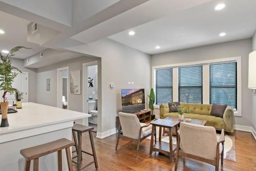 a living room with a couch and a table at 3BR Spacious Apartment with In-Unit Laundry - Kedzie 3F in Chicago