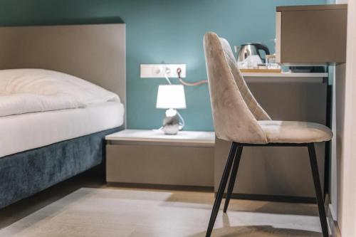 Кровать или кровати в номере Apartmanház Soho