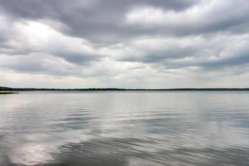 a view of a large body of water at Lakefront Isle Escape with Dock and Fire Pit! in Isle