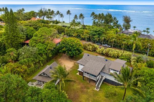an aerial view of a house with the ocean in the background at Ka Hale Olu at Anini Beach TVNC#4218 in Kilauea