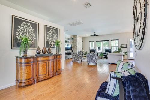a living room with wooden furniture and a living room at Day Trip to Dtwn Phoenix Peoria Retreat with Pool in Peoria