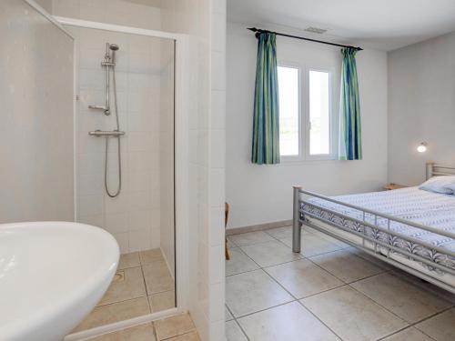 Ένα ή περισσότερα κρεβάτια σε δωμάτιο στο Domaine Oliveraie 8