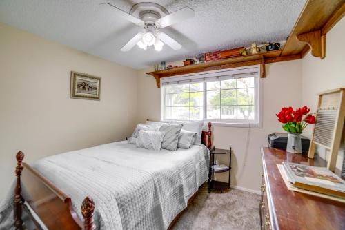 a bedroom with a bed and a window at Dog-Friendly Idaho Falls Vacation Rental with Yard! in Idaho Falls