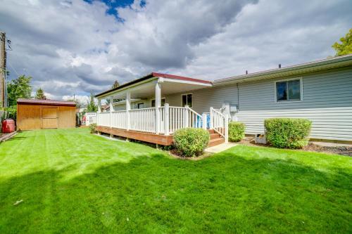 a house with a large yard in front of it at Dog-Friendly Idaho Falls Vacation Rental with Yard! in Idaho Falls