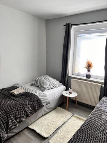 Postel nebo postele na pokoji v ubytování Ferienhaus Herztor