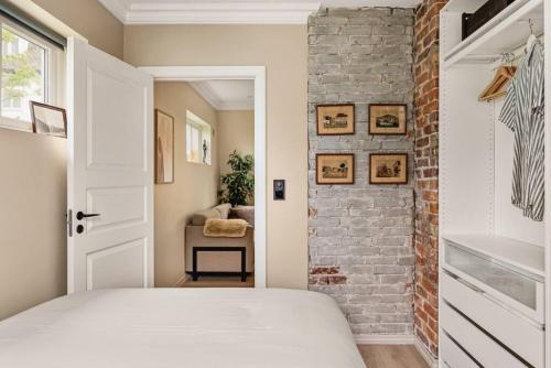 Llit o llits en una habitació de Dinbnb Apartments I New 2021 I SONOS and SMART TV