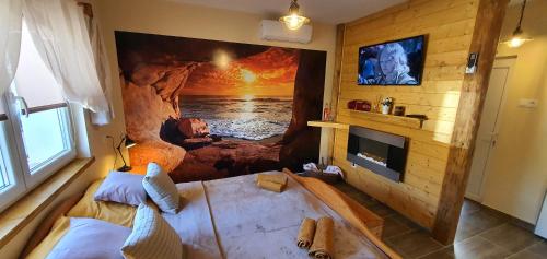 Televisyen dan/atau pusat hiburan di Joy's apartman Molnári