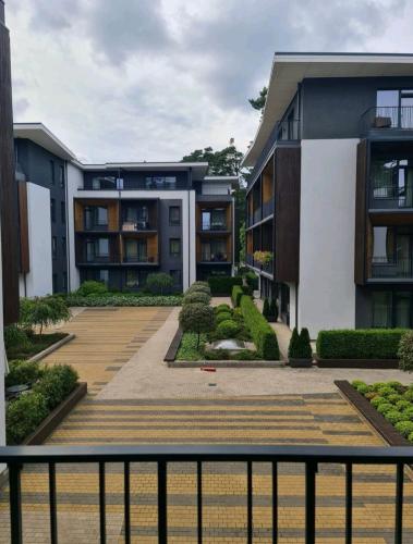 a view of an apartment complex from a balcony at Turaidas apartment Jurmala in Jūrmala
