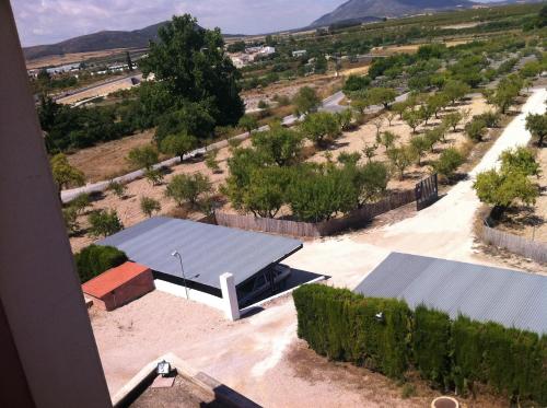 an aerial view of a building with a bus stop at Hotel El Zorro in Barranda