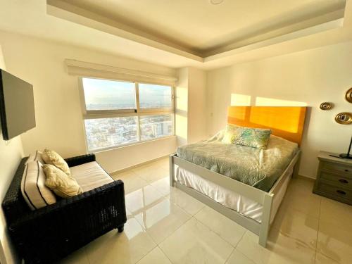 Postel nebo postele na pokoji v ubytování Sunset View Malecón 1401 Vista panoramica al mar