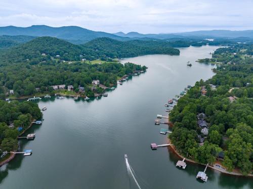 an aerial view of a river with boats on it at Retreat on the Lake in Hiawassee
