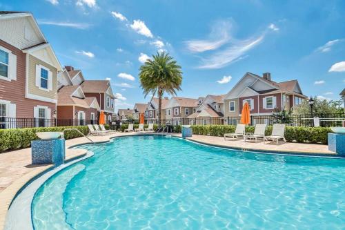 a swimming pool in a villa with a house at NEW awesome dream house, 5 Min to Disney in Orlando