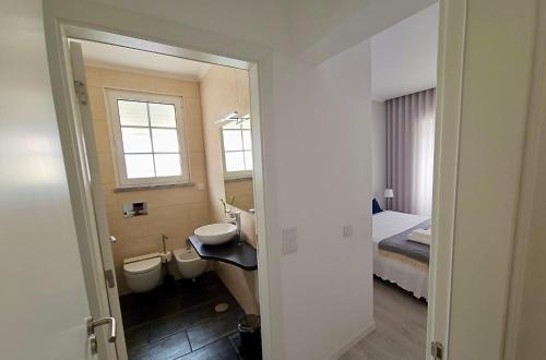 Ένα μπάνιο στο Casa do Chafariz - Guest House