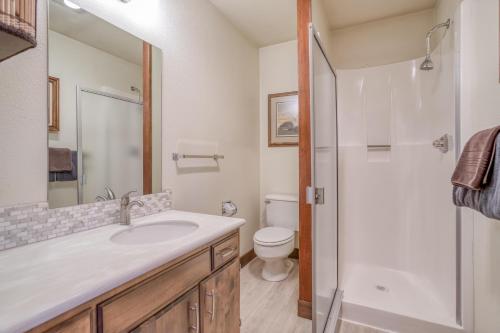 a bathroom with a sink and a toilet and a shower at The Viking (MCA 410) in Manzanita
