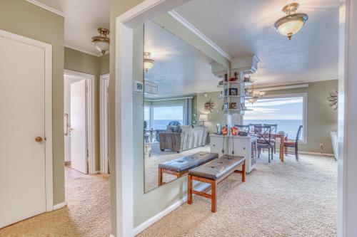 a kitchen and dining room with a view of the ocean at Gardner Family House #1 in Depoe Bay