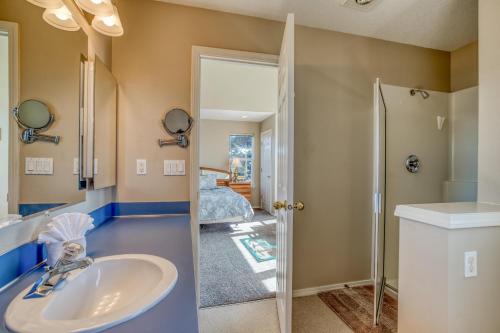 a bathroom with a sink and a shower at Seaside Vacation Rental in Seaside