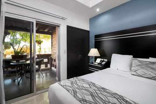 Giường trong phòng chung tại Best Western Plus San Jorge