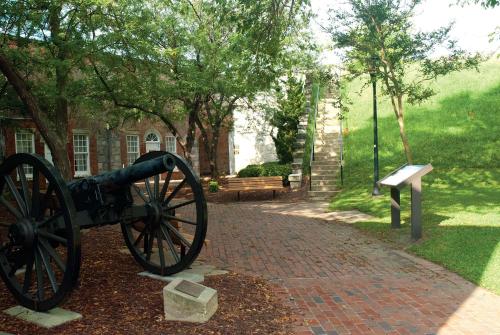 a cannon sitting on a brick path in a park at Hampton Inn Hampton-Newport News in Hampton