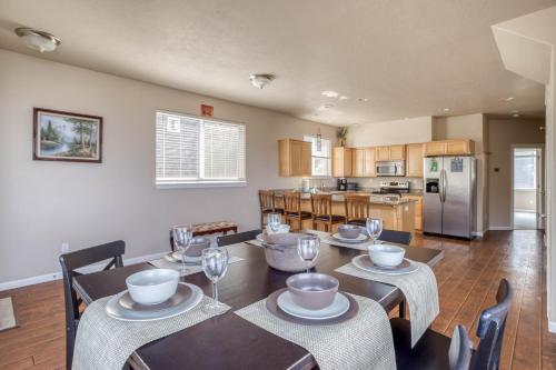a kitchen and dining room with a table and chairs at Oceana House in Lincoln City
