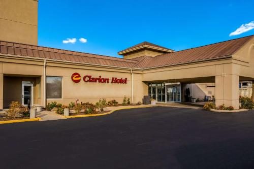 a store front of a carolina inn at Clarion Hotel & Convention Center Joliet in Joliet