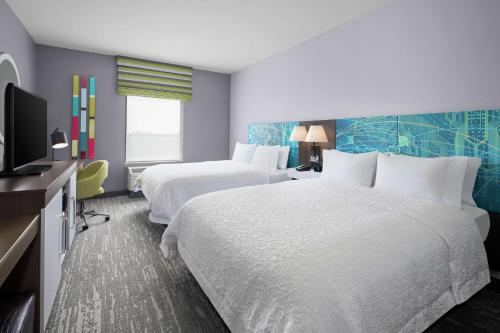 Postel nebo postele na pokoji v ubytování Hampton Inn Sikeston