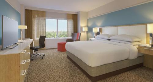 Ένα ή περισσότερα κρεβάτια σε δωμάτιο στο Hilton Miami Dadeland