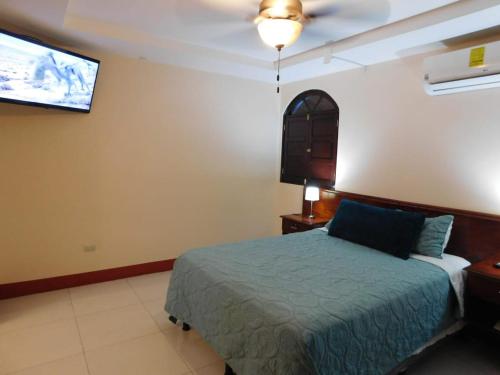 Postel nebo postele na pokoji v ubytování Habitaciones - Casa Lester