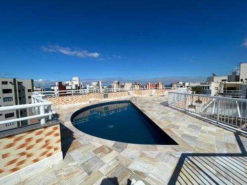 Kolam renang di atau dekat dengan FLAT RIVIERA COM VISTA MAR A 150m DA PRAIA !