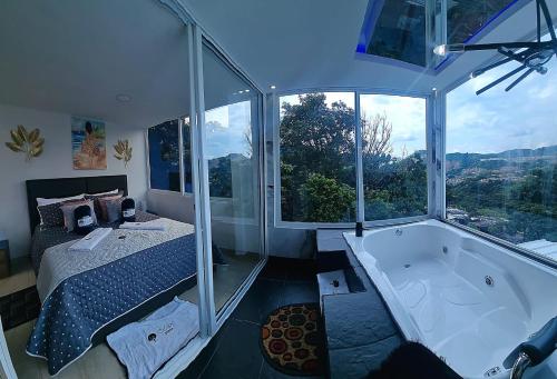 Katil atau katil-katil dalam bilik di Ayenda Ceiba Rooms